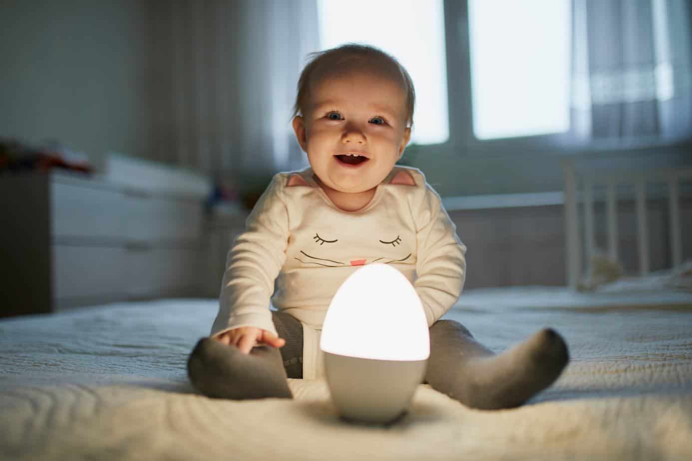 happy baby with night light lamp
