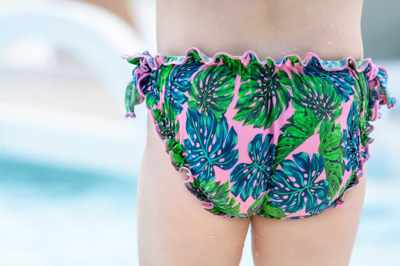 toddler wearing greatly designed underwear in the beach
