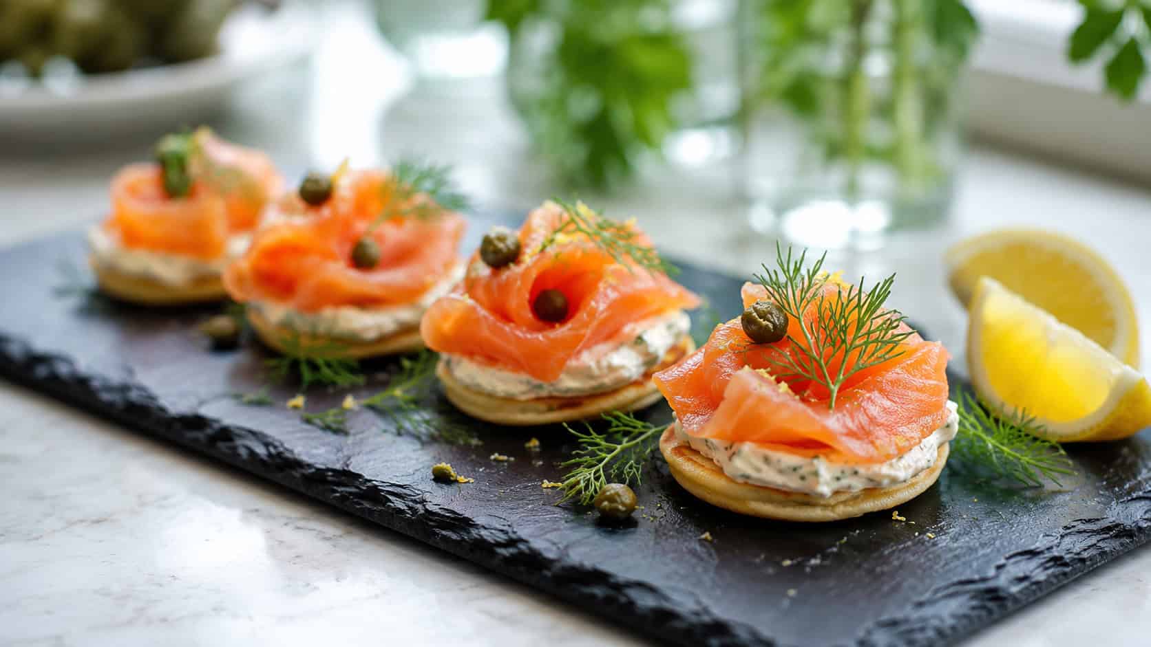 elegant smoked salmon canapés arranged on a long slate board in a wide horizontal shot, herbed cream cheese, ribbons of salmon, capers and dill, lemon wedges nearby, bright natural light, shallow depth of field, landscape orientation