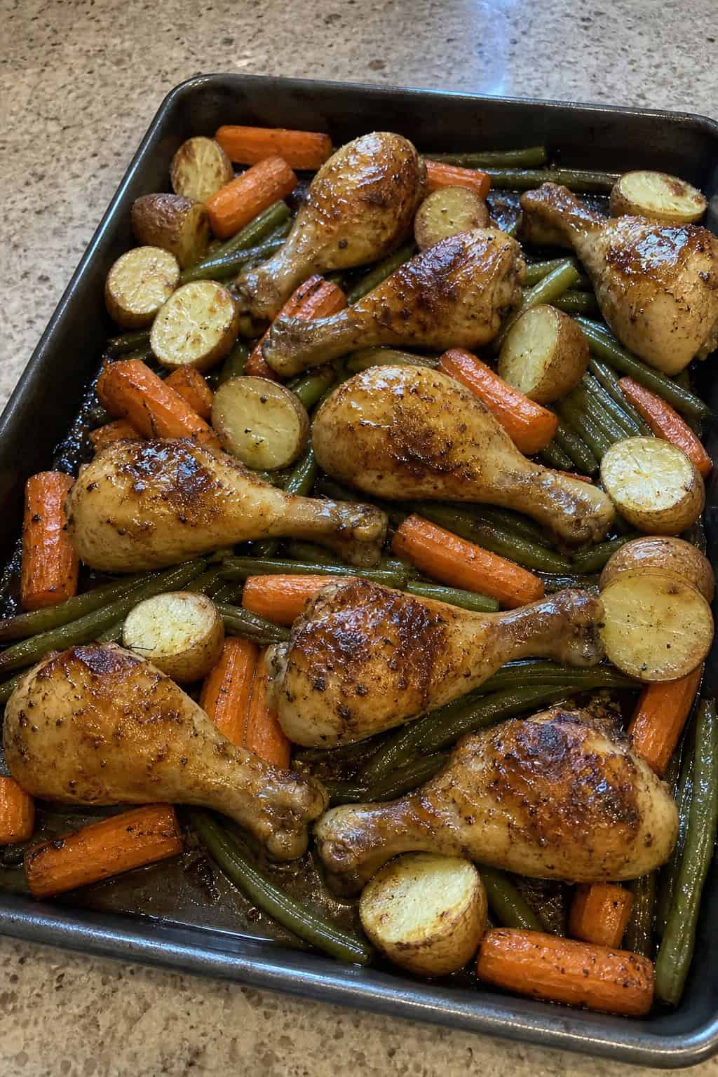 Chicken Drumstick Recipes Kids Actually Eat 12 Caramelized maple mustard glazed chicken drumsticks on a foil-lined sheet pan with roasted root vegetables and a scattering of flat-leaf parsley.