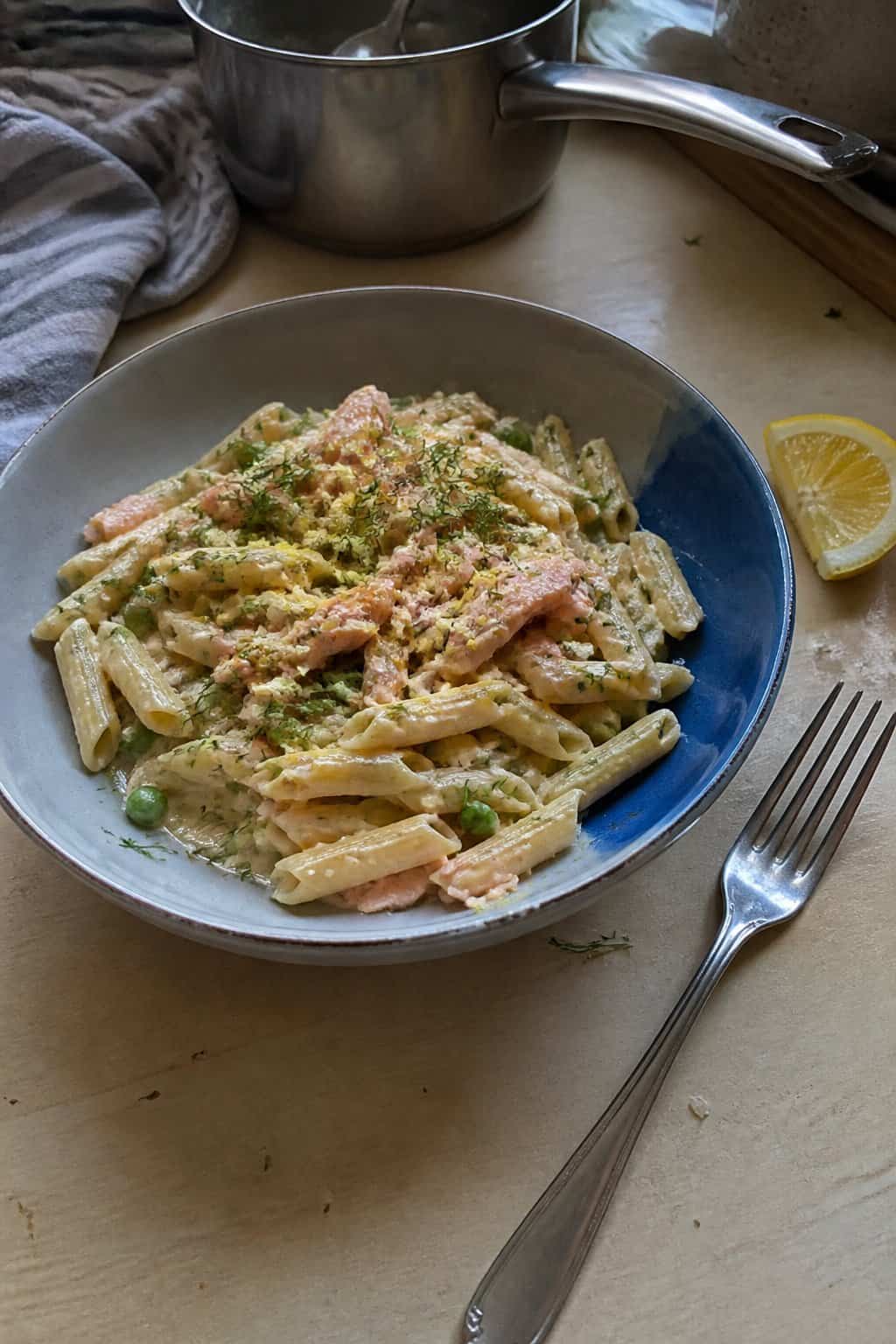 17 Pasta Dinners That Feel Fancy But Use Pantry Staples 12 A bowl of pasta tossed with flaked pink salmon, fresh dill, and lemon zest