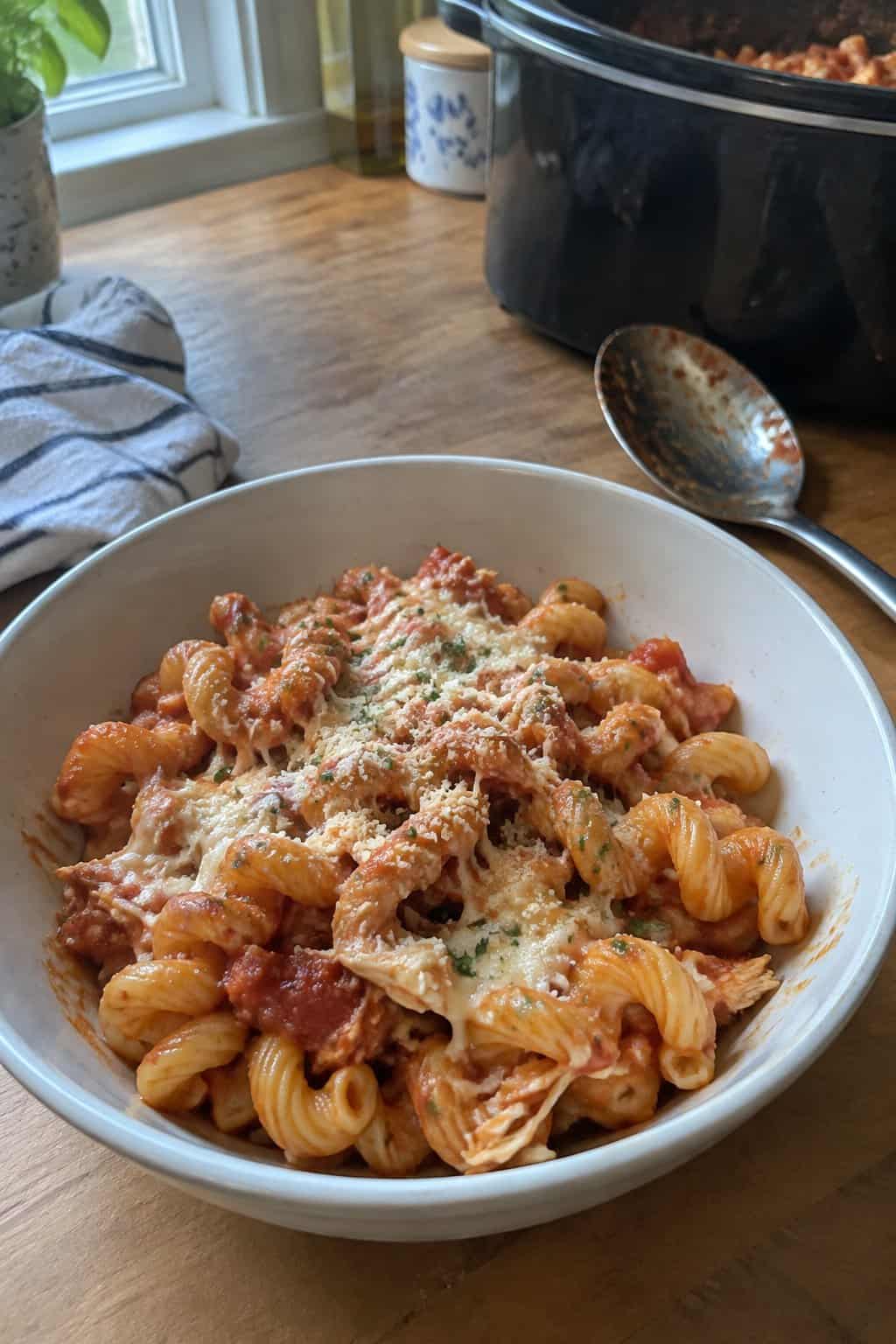 Curled cavatappi pasta tossed with marinara, shredded chicken, and melted mozzarella.