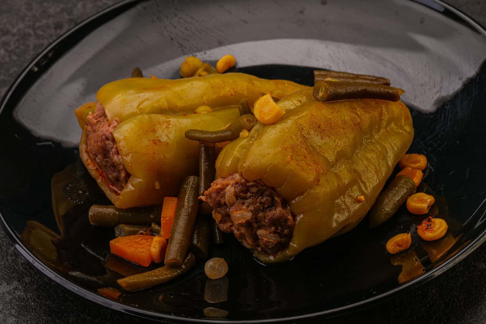 These 20 Easy Ground Beef and Rice Dishes Will Save Your Busy Weeknights 56 One-Pot Beef and Rice Stuffed Peppers on a plate