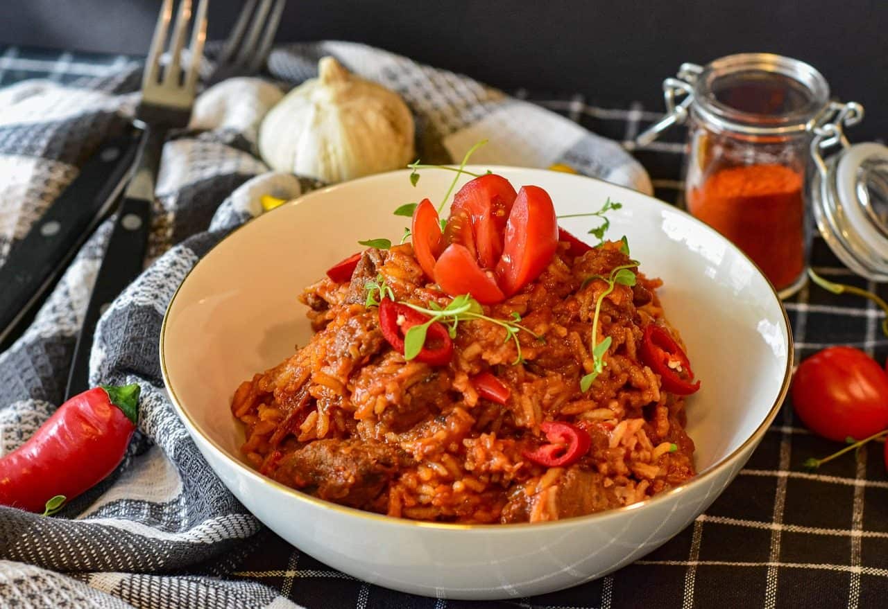 These 20 Easy Ground Beef and Rice Dishes Will Save Your Busy Weeknights 44 5-Ingredient Beef and Tomato Rice Skillet on a plate