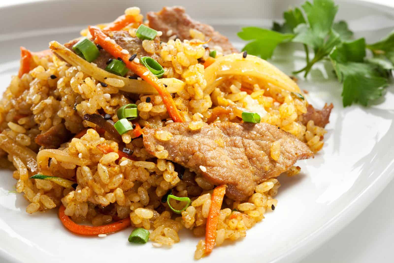 These 20 Easy Ground Beef and Rice Dishes Will Save Your Busy Weeknights 48 Easy Beef & Veggie Fried Rice on a plate