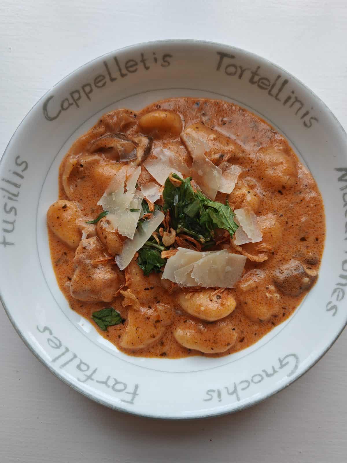 Chicken gnocchi garnished