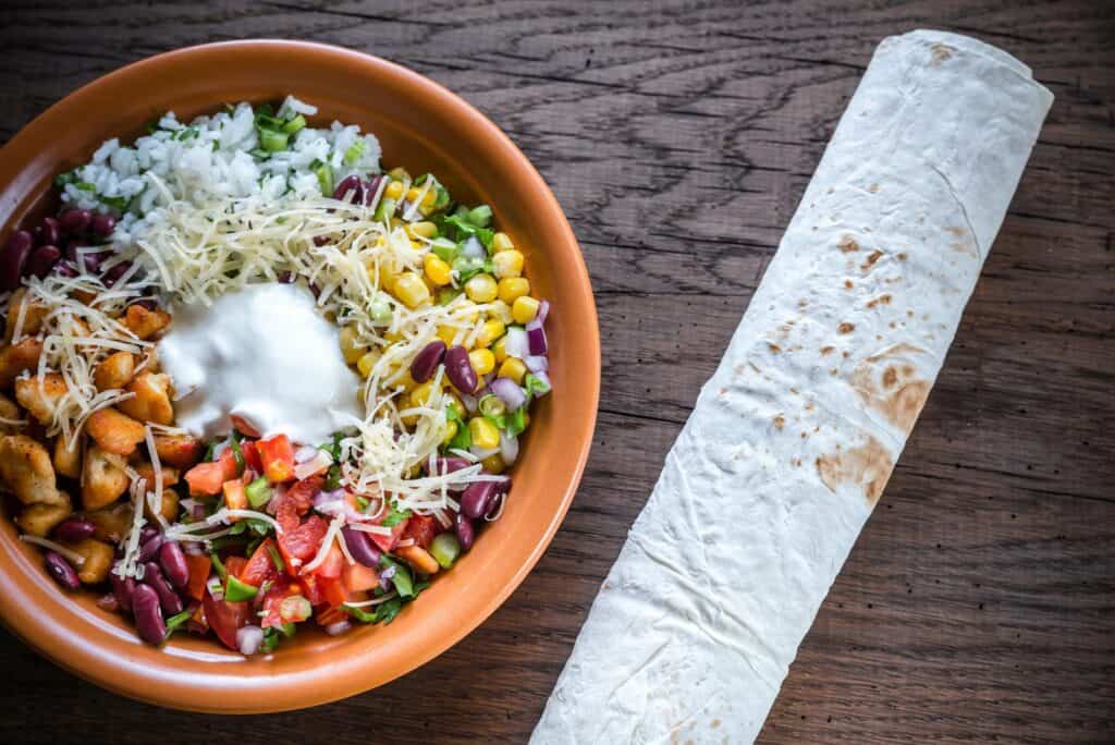 Quick Chicken Dinners for Moms Who Forgot to Thaw Anything 18 Chicken Taco Bowls with Microwave Rice on a plate