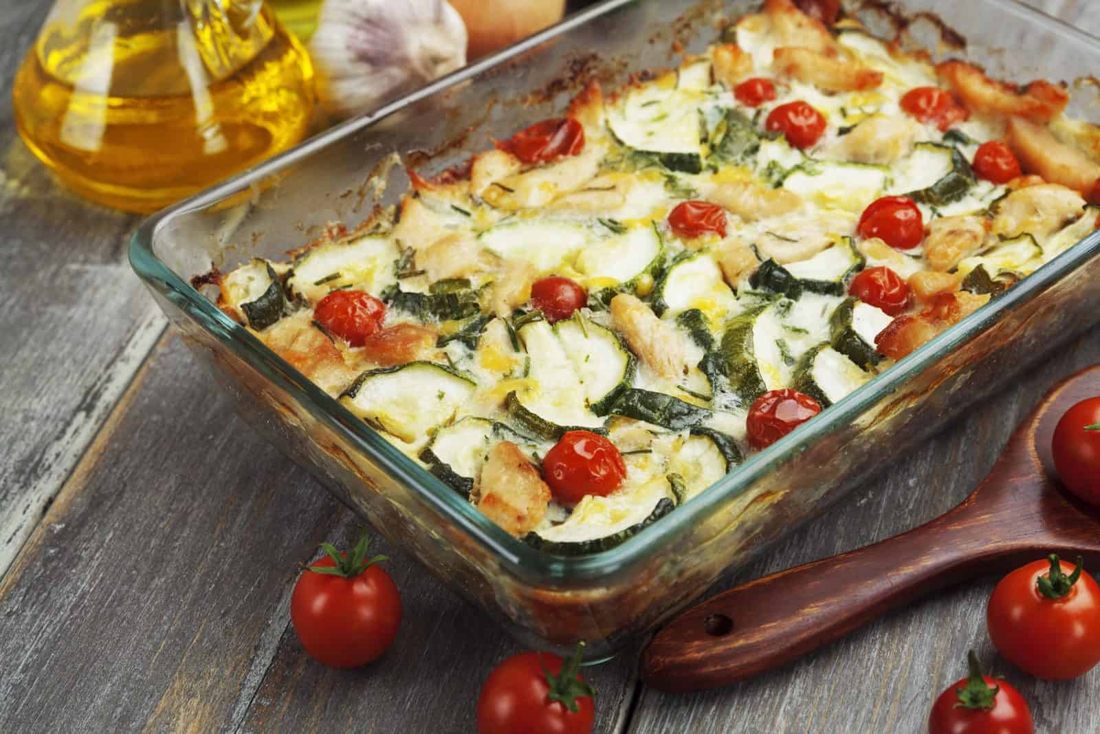 25 Dump-and-Bake Casserole Recipes for Busy Moms 44 Zucchini casserole in a glass baking dish