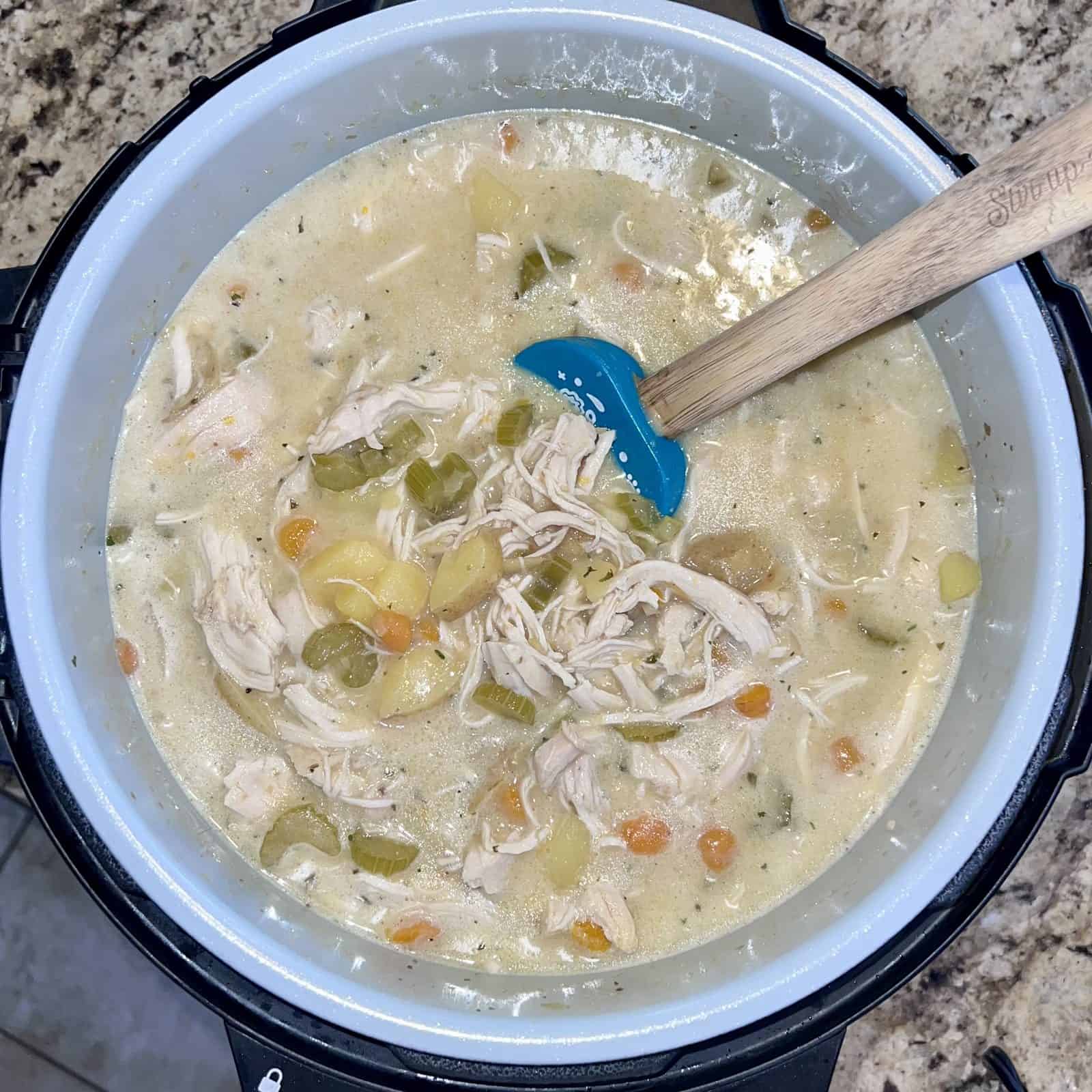 Creamy chicken pot pie soup in a slow cooker