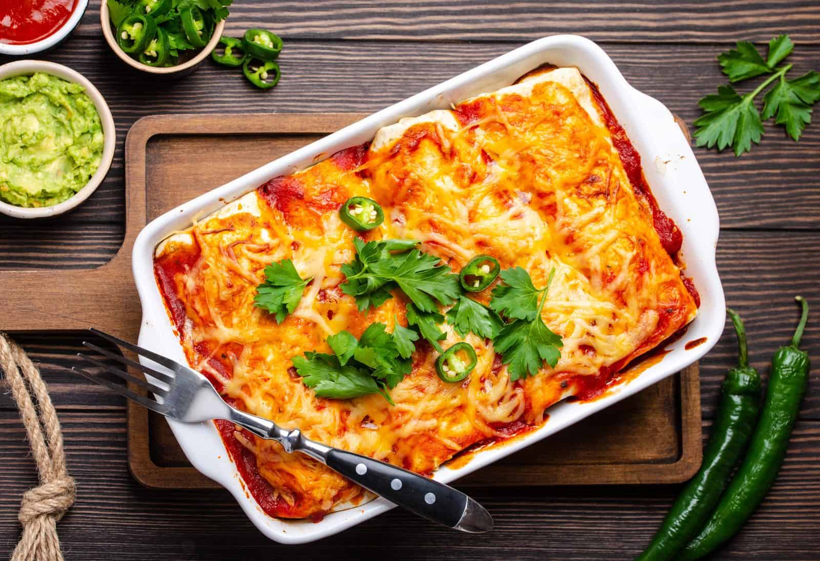 20 Ground Beef Dinners That Stretch One Pound 8 Beef and bean enchilada casserole