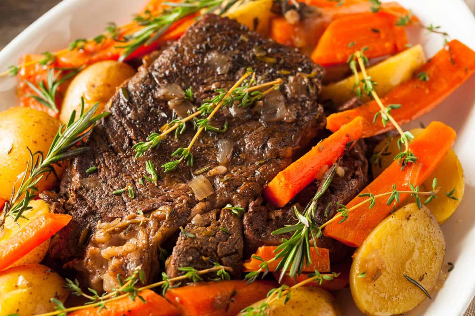 20 Easy Slow Cooker Pot Roast Recipes for Busy Moms 40 Garlic herb pot roast