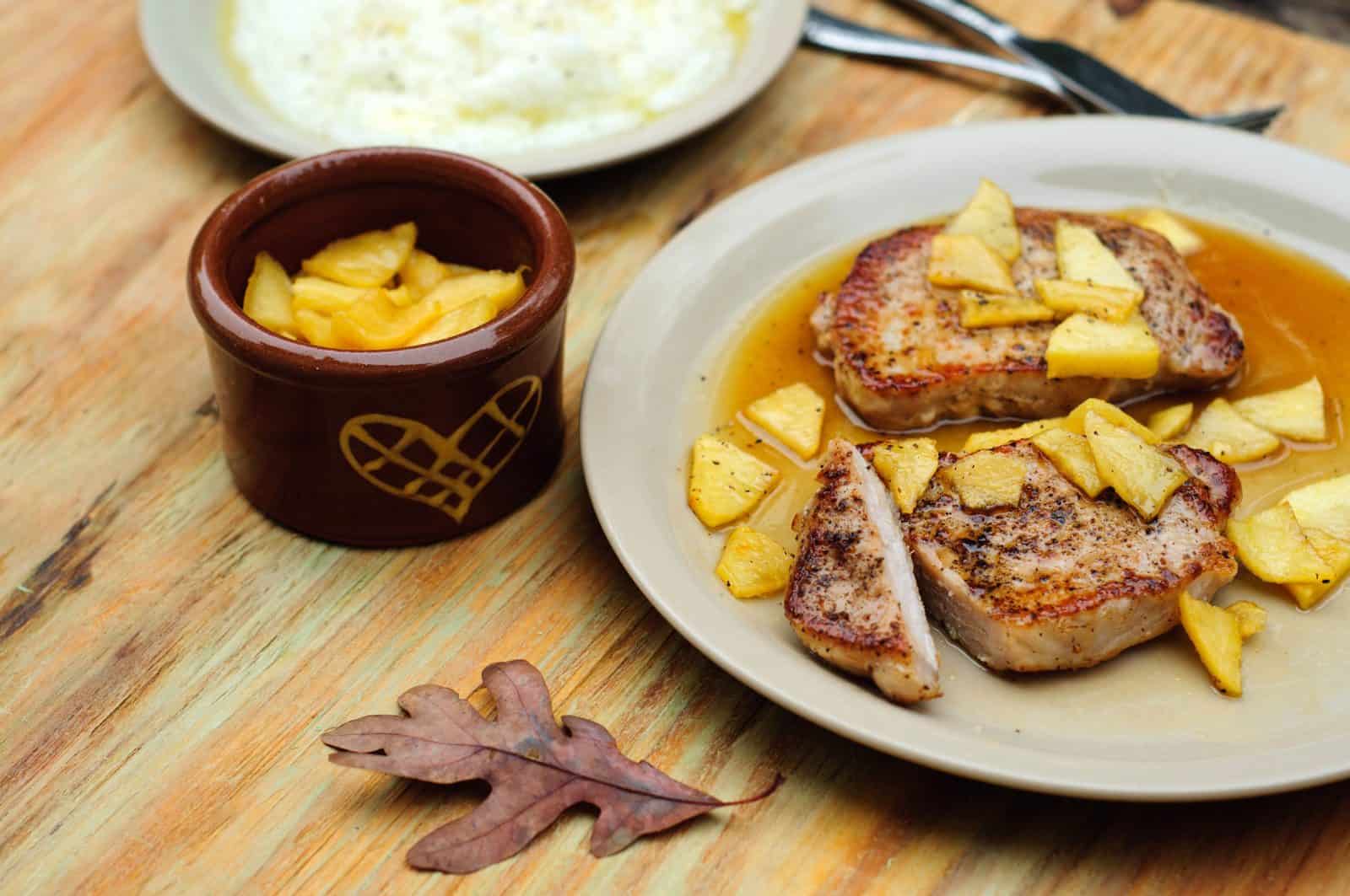 Crockpot Boneless Pork Chop Recipes for Hungry Families 12 Apple Cinnamon Pork Chops on a plate