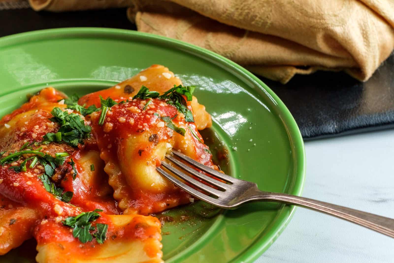 Ravioli with marinara and parmesan