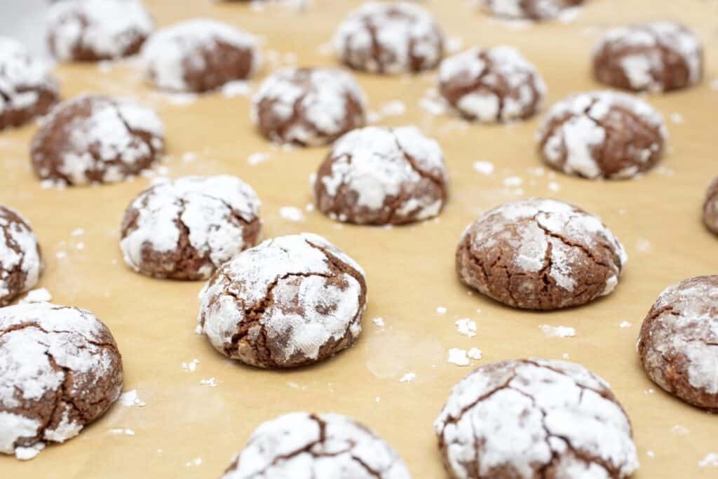 Chocolate crinkle cookies dusted with powdered sugar