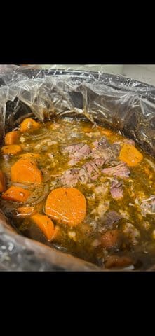 Finished pot roast in the crockpot.