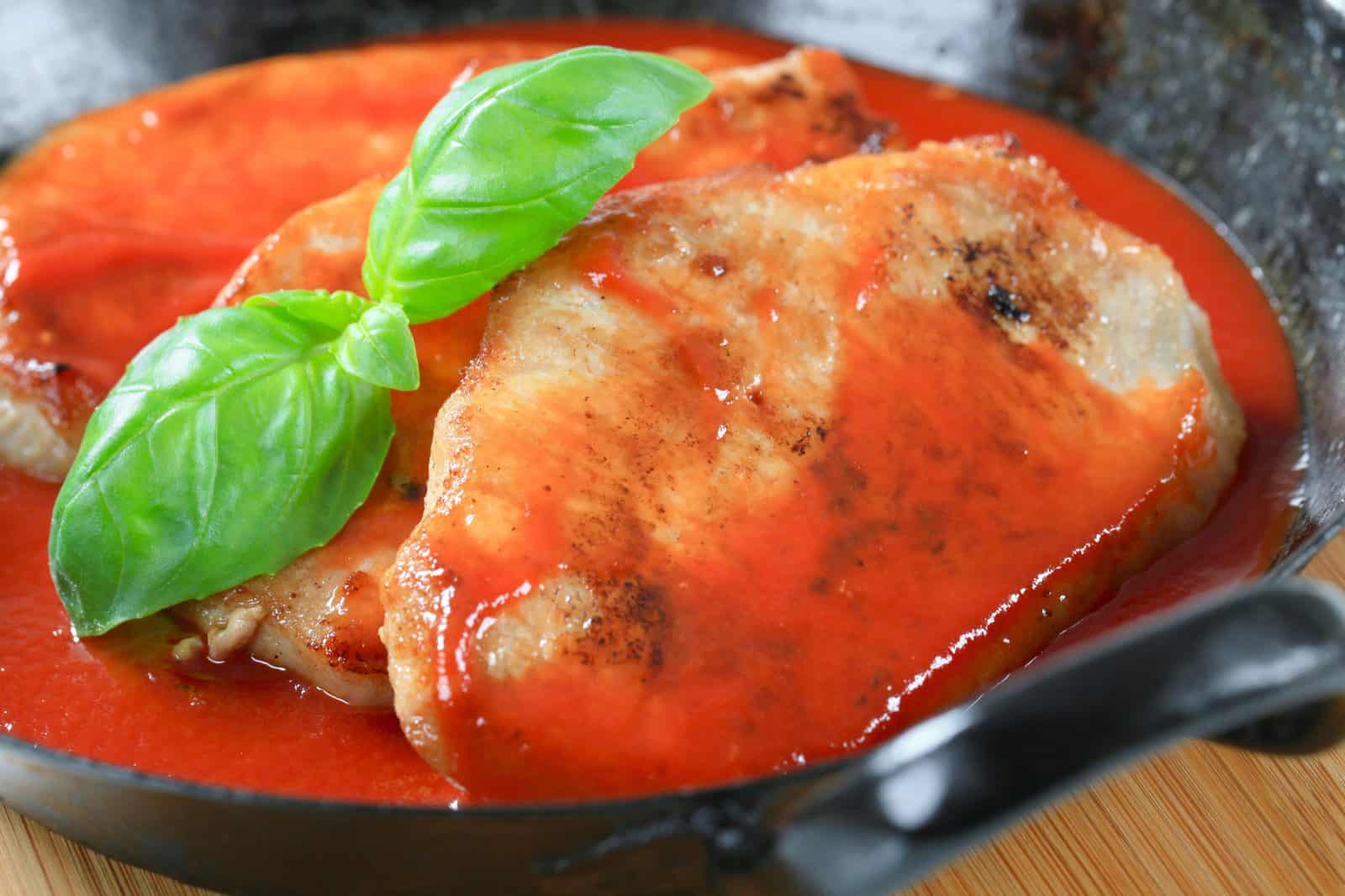 Crockpot Boneless Pork Chop Recipes for Hungry Families 17 Italian-Style Pork Chops on a plate