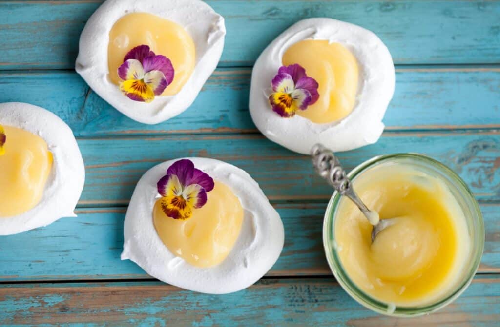 Lemon Curd Pavlova Nests on a plate