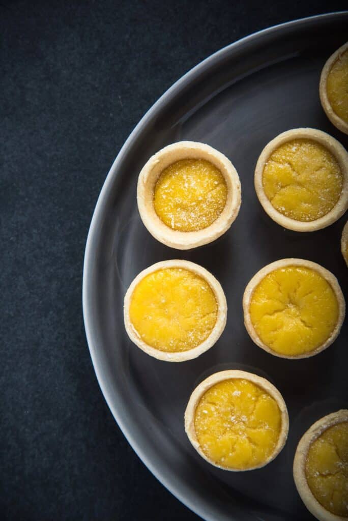 Mini Lemon Cream Tarts on a plate