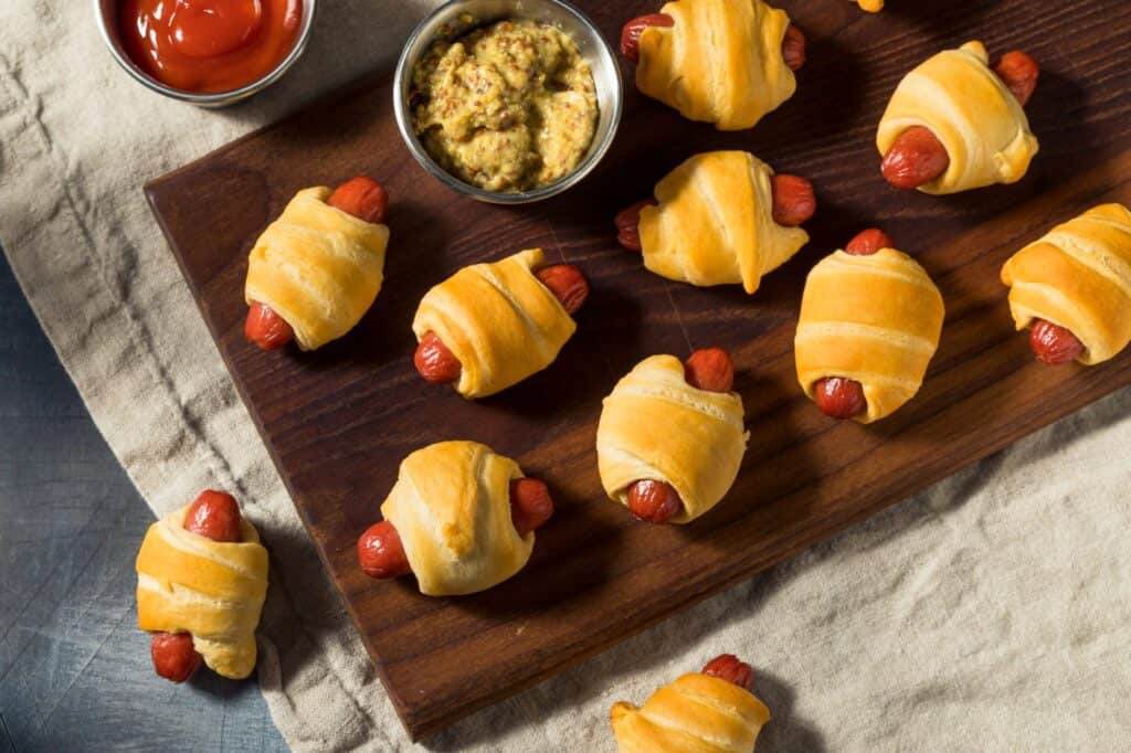 Vegan Appetizers That Disappear Fast at Parties 19 Mini Sausage Crescent Wraps on a plate