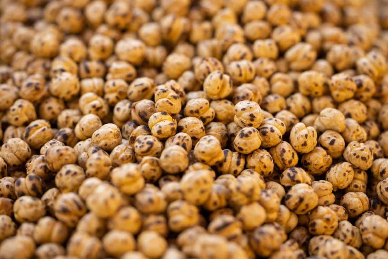 Thanksgiving Appetizers to Start the Feast 93 Pumpkin Spice Roasted Chickpeas on a plate