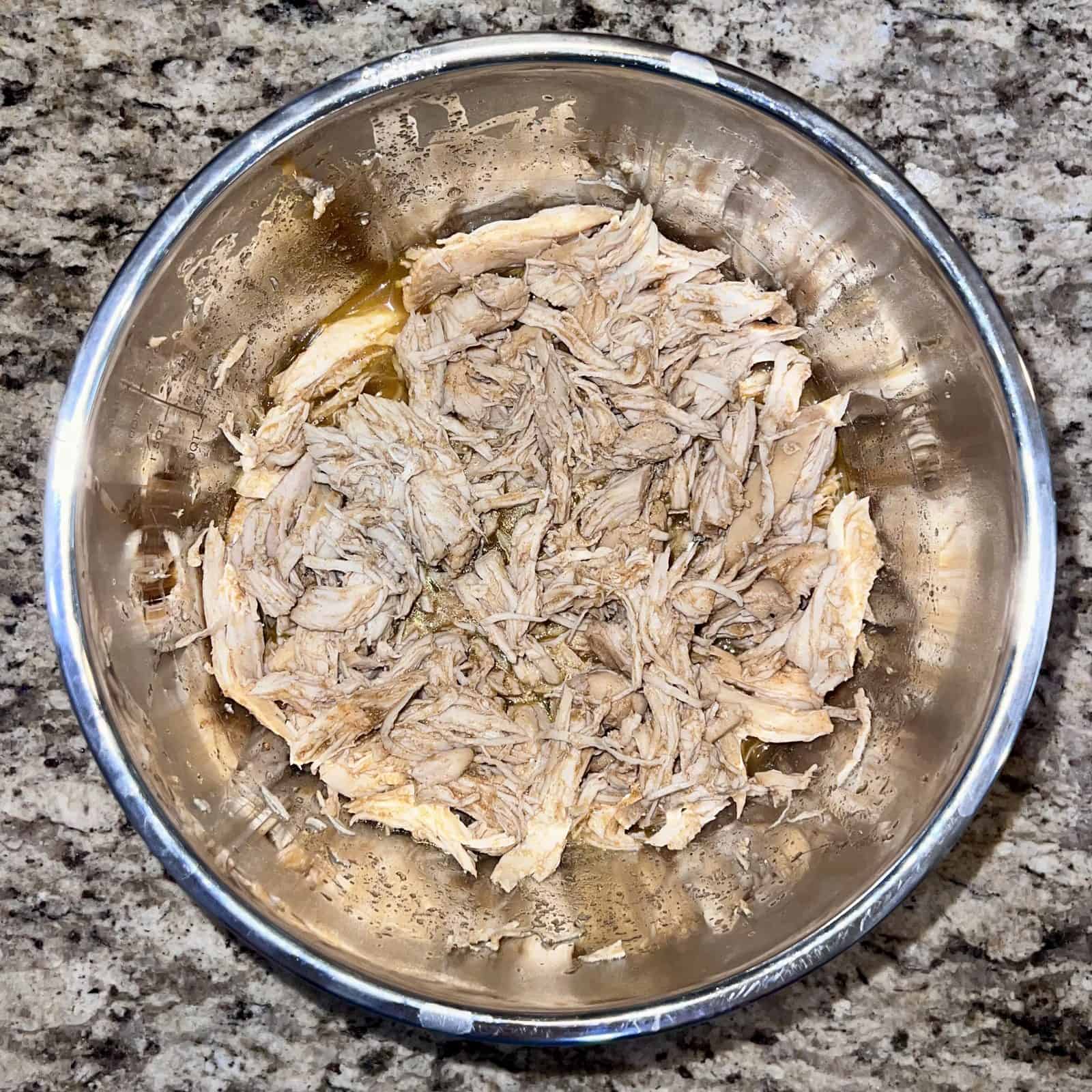 Slow Cooker Shredded Taco Chicken 3 shredded taco chicken in a serving bowl