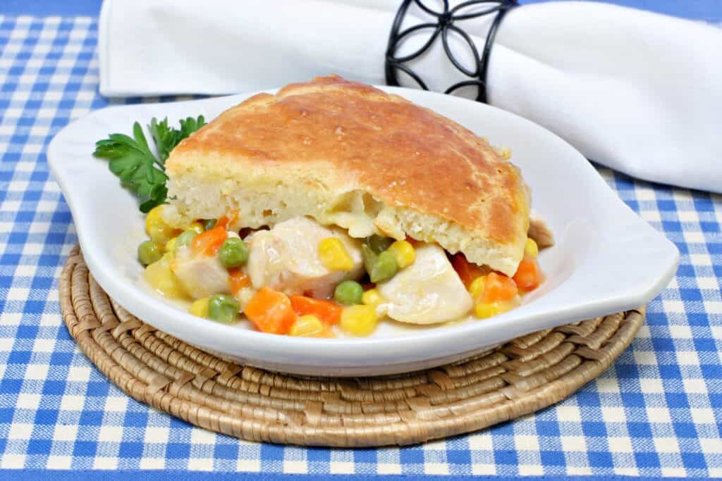 Quick Chicken Dinners for Moms Who Forgot to Thaw Anything 15 Skillet Chicken Pot Pie with Refrigerated Biscuits on a plate