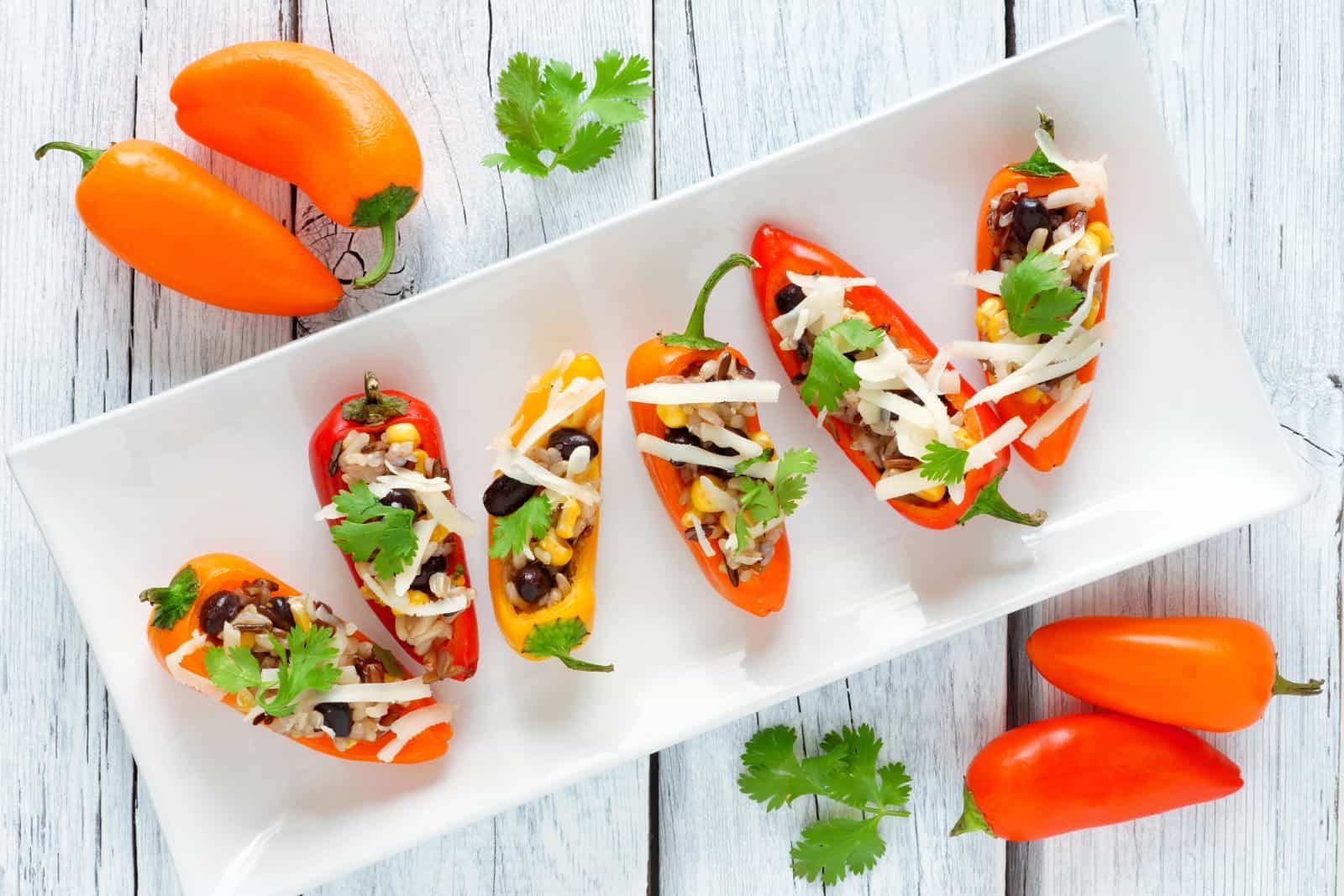 Vegan Appetizers That Disappear Fast at Parties 41 Stuffed Mini Bell Peppers on a plate