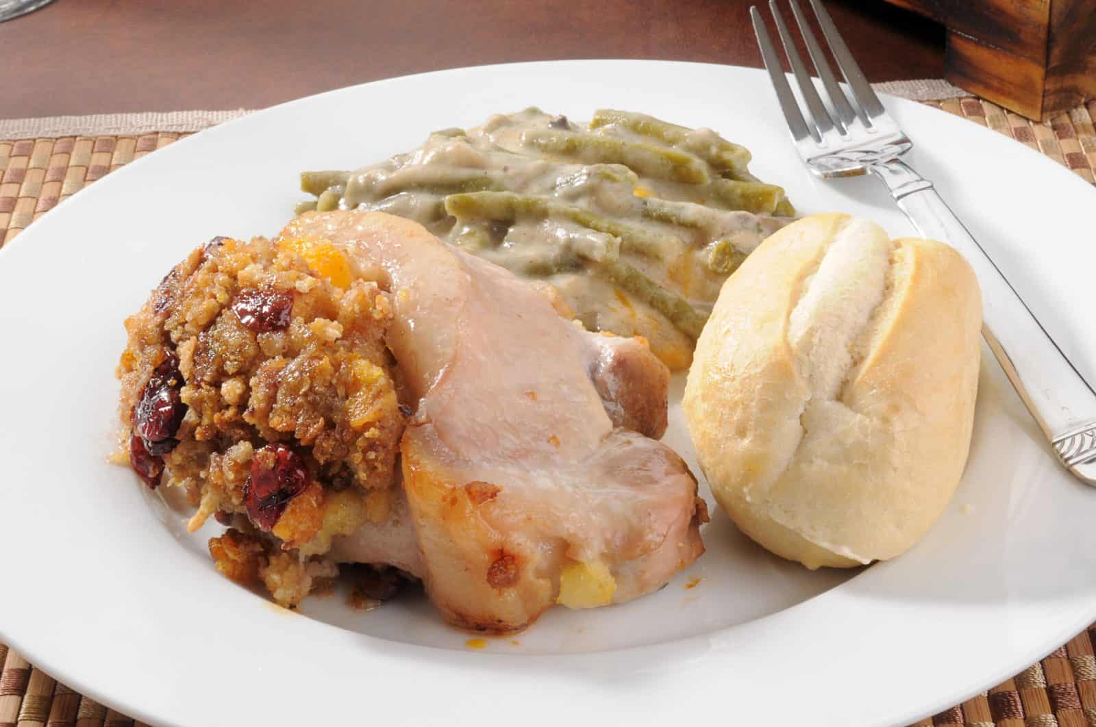 Crockpot Boneless Pork Chop Recipes for Hungry Families 22 Pork Chops with Stuffing on a plate