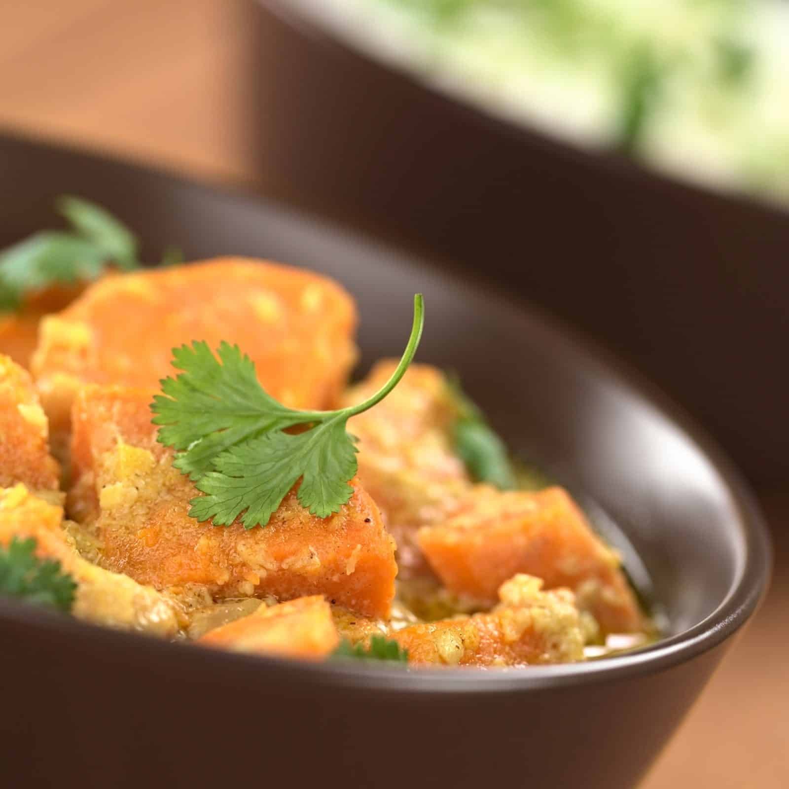 Vegetarian Main Dishes for Family Dinners 63 Sweet Potato and Peanut Curry on a plate