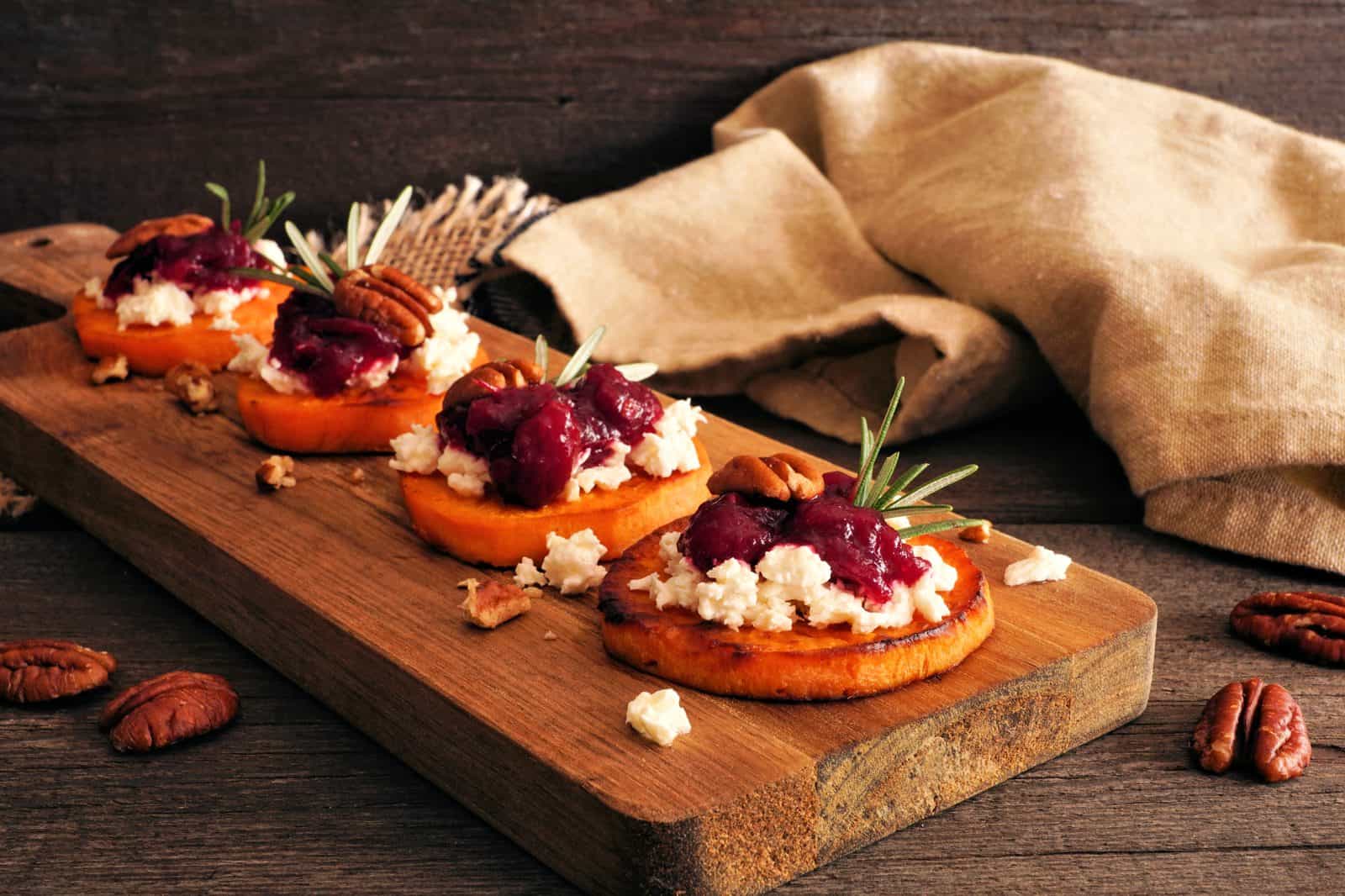 Thanksgiving Appetizers to Start the Feast 69 Sweet Potato Bites on a plate